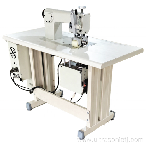 Ultrasonic tablecloth embossing and hemming machine in continuous operation